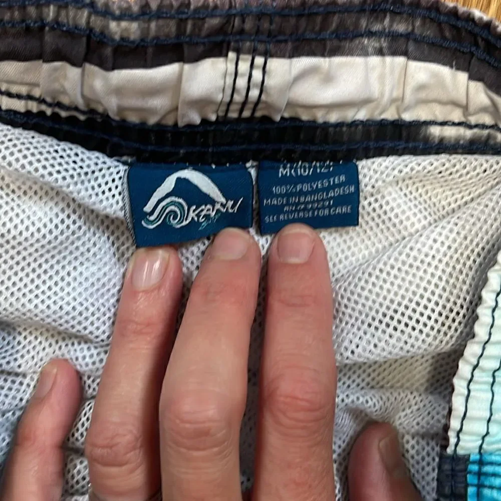 Kanu surf swimming shorts. Drawstring waist. Size medium. Size 10/12. Pocket.